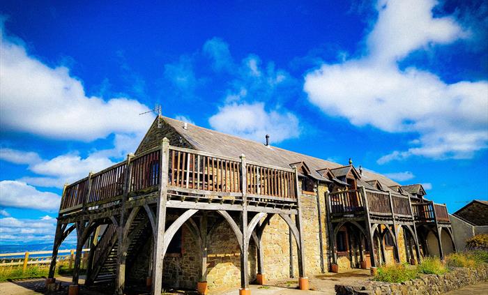 Green oak balconies crafted from our woodland